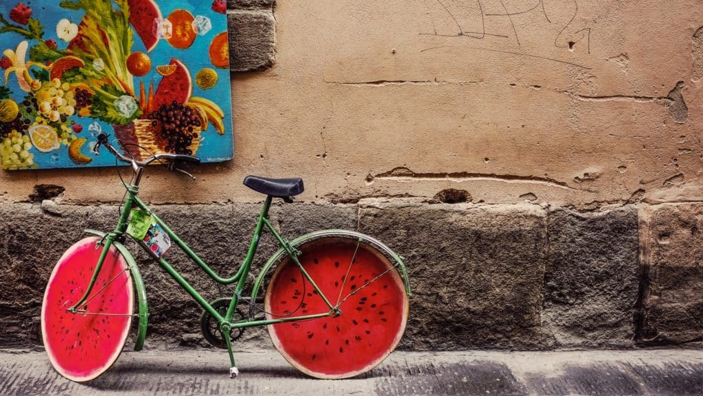 bicycle beside wall